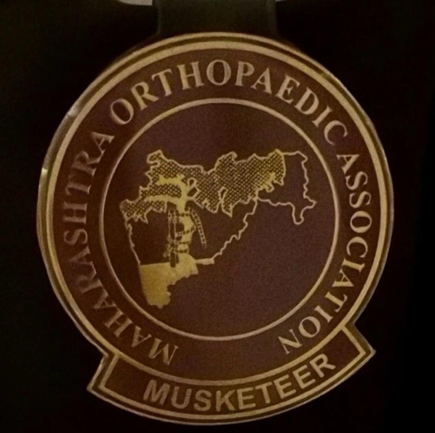Maharashtra Orthopaedic Association Musketeer emblem